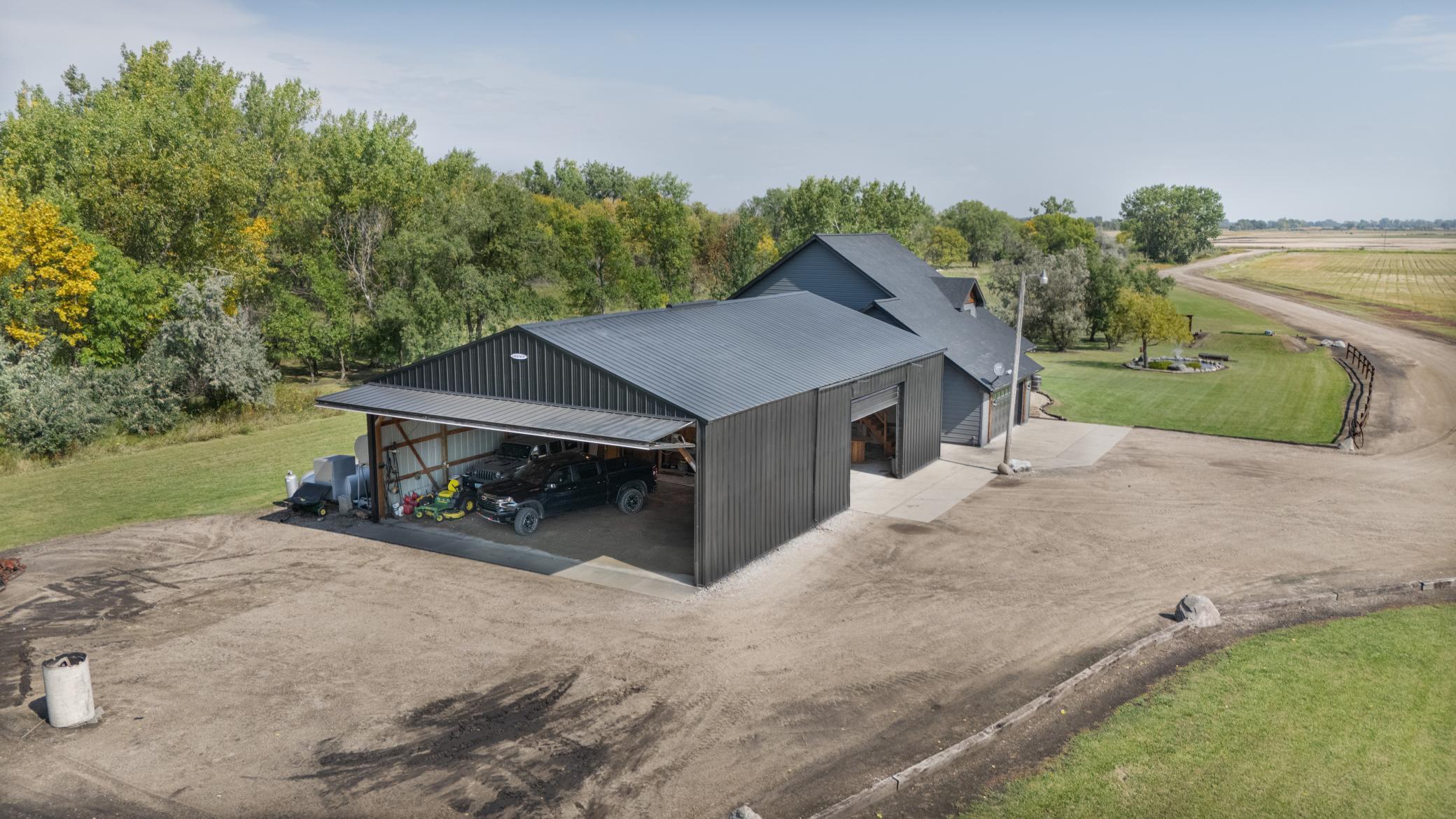 1994 single family home for sale at 635 20th Street NE in Thompson, ND — 3 bed, 3 bath (photo 2 of 61)