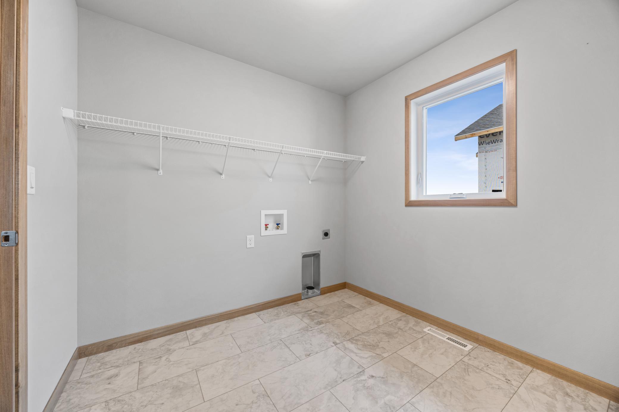 2026 single family home for sale at 1015 61st Avenue W in West Fargo, ND — 5 bed, 3 bath (photo 21 of 29)