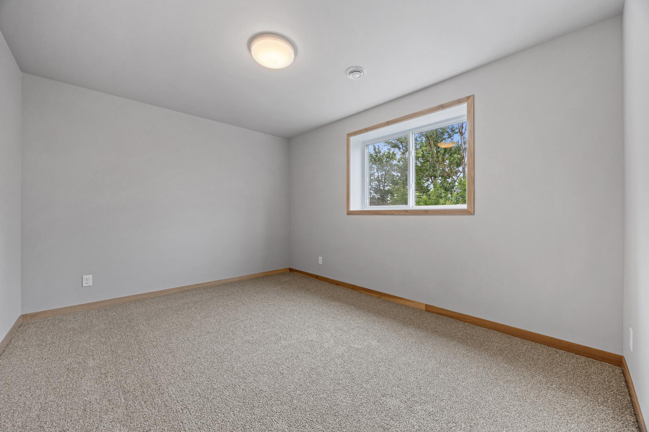 2026 single family home for sale at 1015 61st Avenue W in West Fargo, ND — 5 bed, 3 bath (photo 25 of 29)