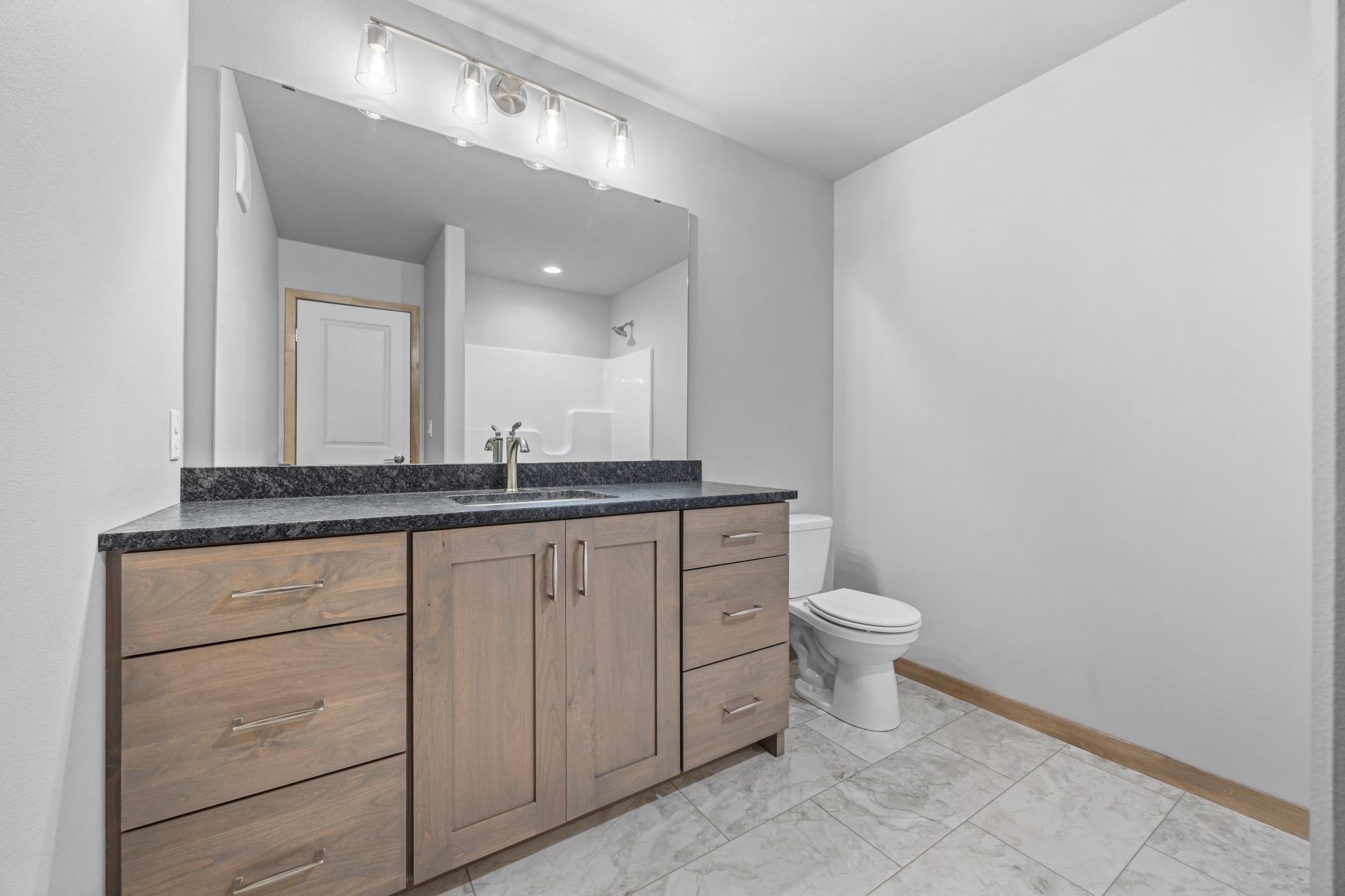 2026 single family home for sale at 1015 61st Avenue W in West Fargo, ND — 5 bed, 3 bath (photo 9 of 29)