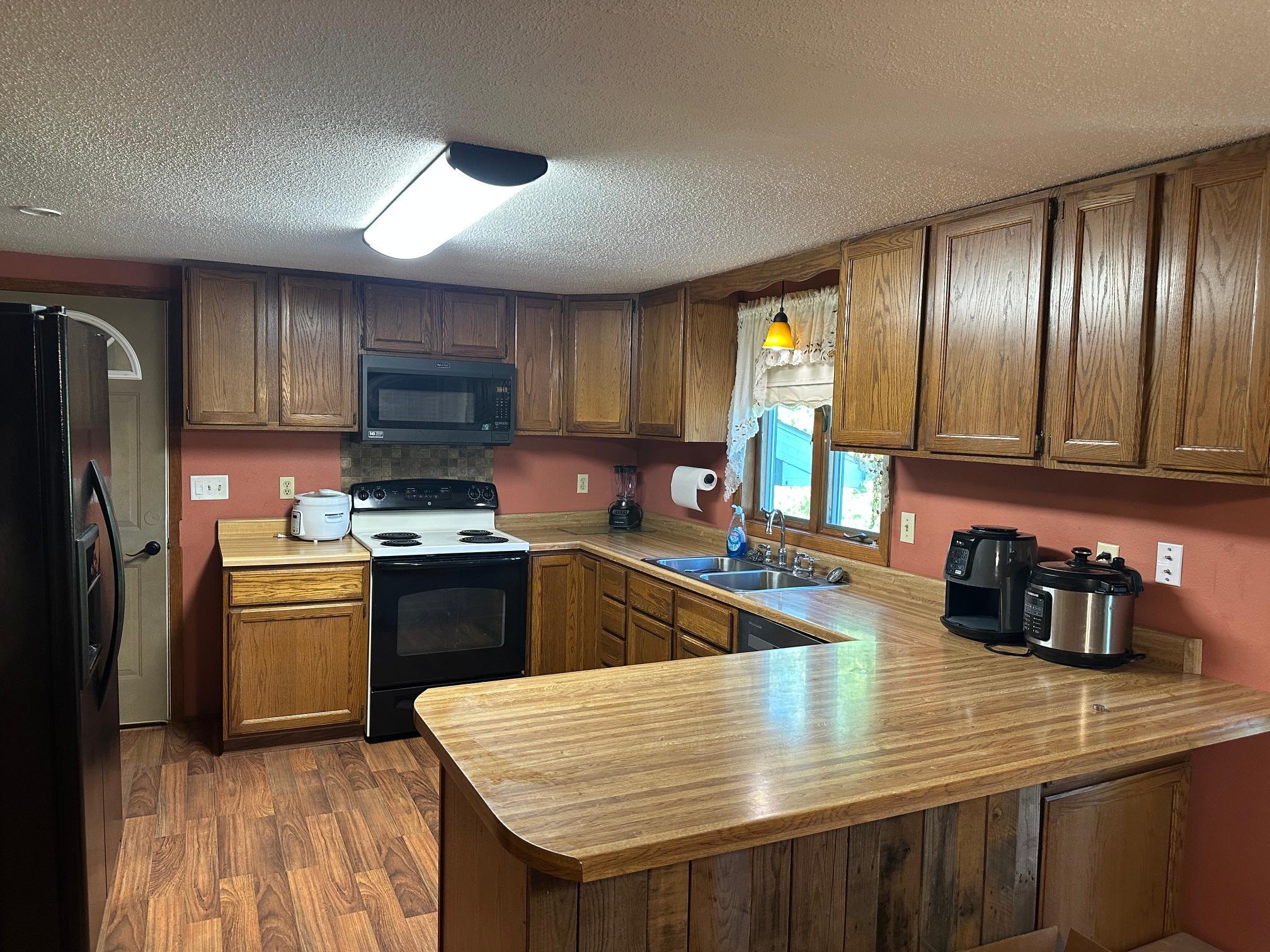 1957 single family home for sale at 408 3rd Avenue NW in LaMoure, ND — 3 bed, 2 bath (photo 10 of 46)