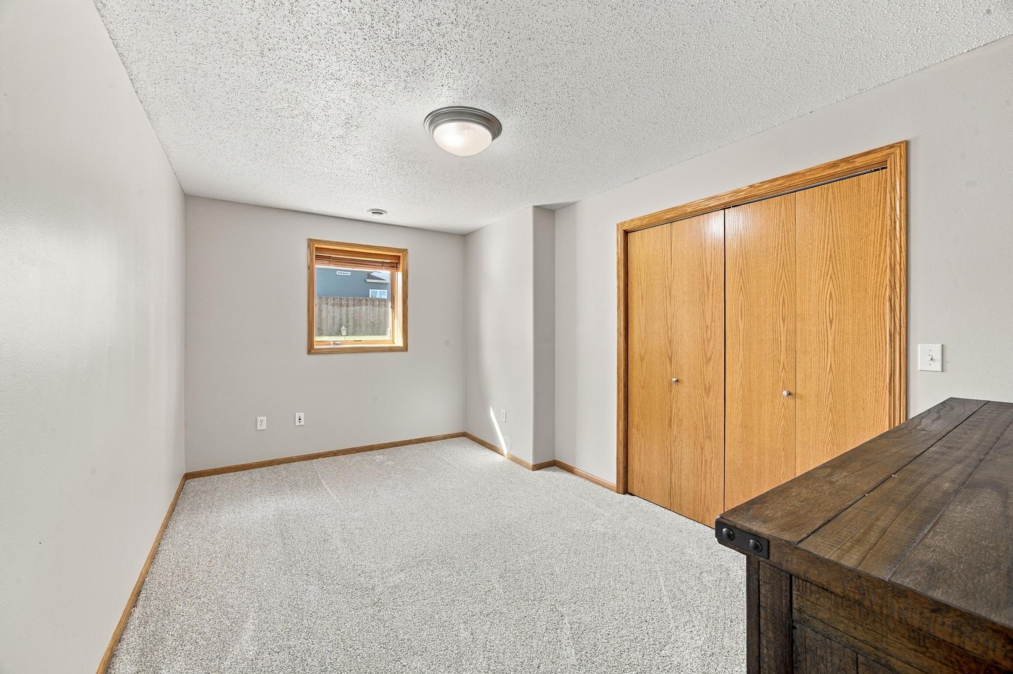 2002 single family home for sale at 675 Wyndemere Drive in West Fargo, ND — 4 bed, 3 bath (photo 27 of 47)