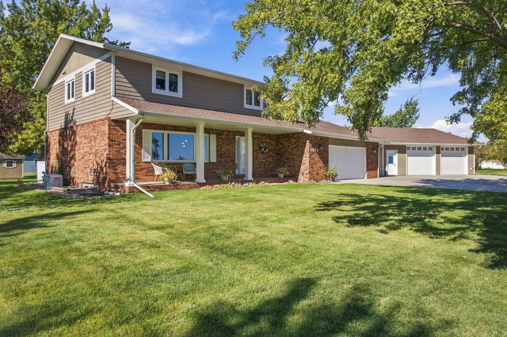 1972 single family home for sale at 3478 45th Street N in Reiles Acres, ND — 4 bed, 5 bath (photo 2 of 56)
