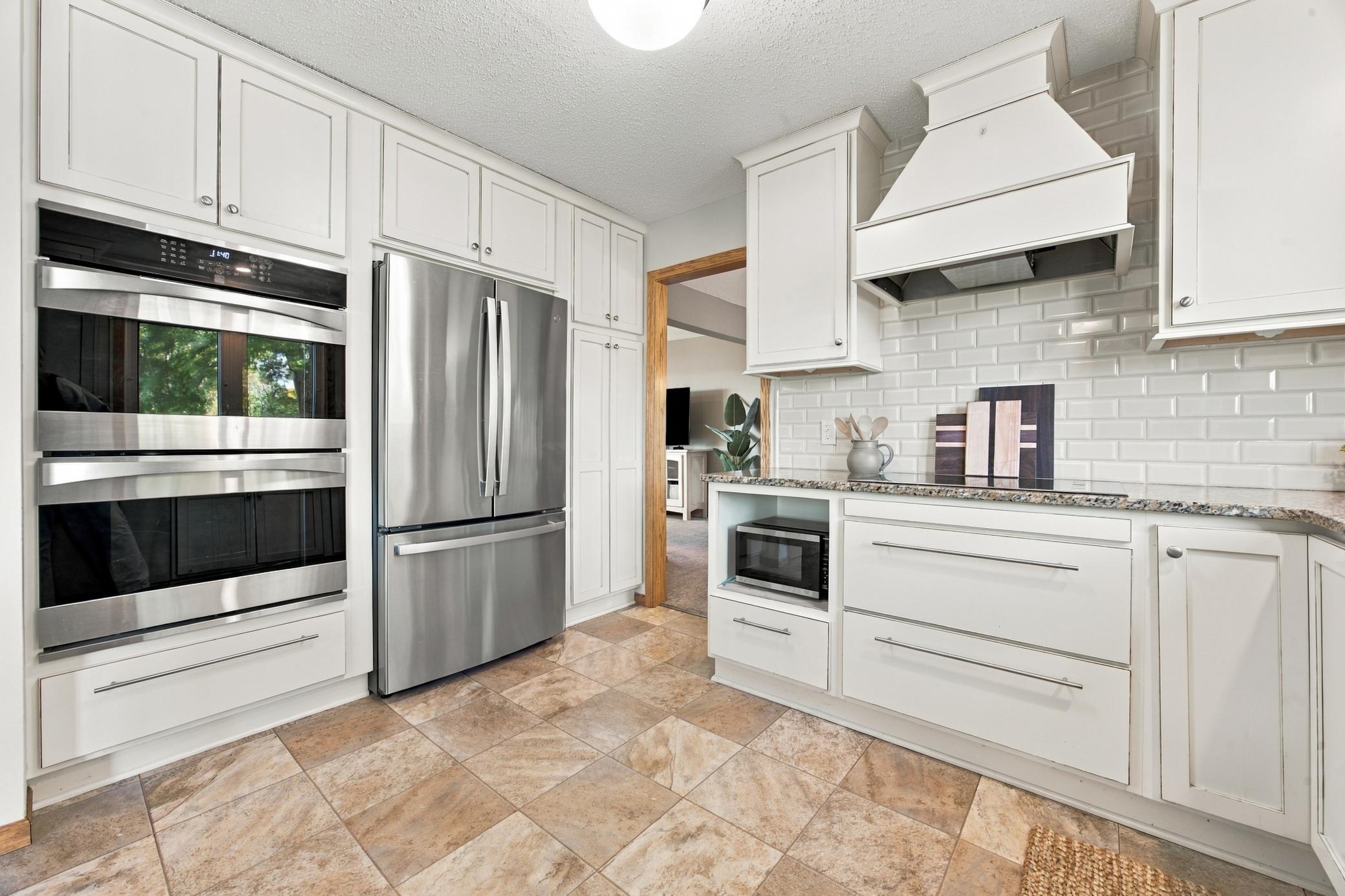1972 single family home for sale at 3478 45th Street N in Reiles Acres, ND — 4 bed, 5 bath (photo 11 of 56)