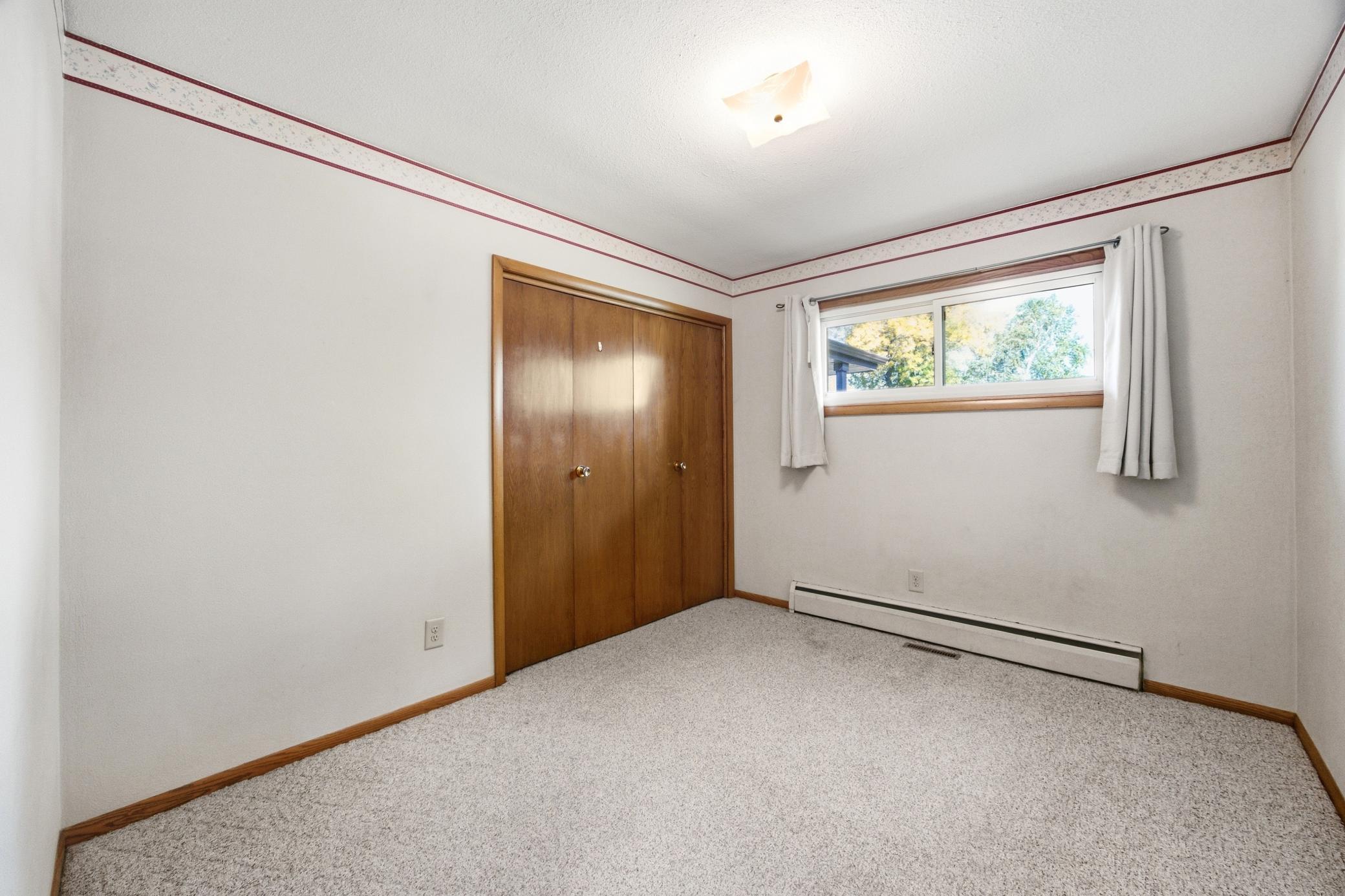 1961 single family home for sale at 90 Cedar Avenue N in Fargo, ND — 4 bed, 2 bath (photo 25 of 47)