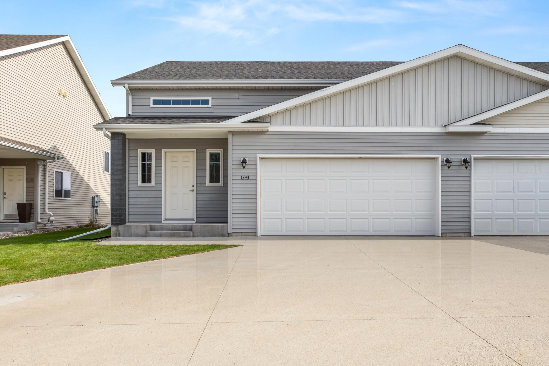 2014 twin home for sale at 1343 13th Street W in West Fargo, ND — 3 bed, 2 bath