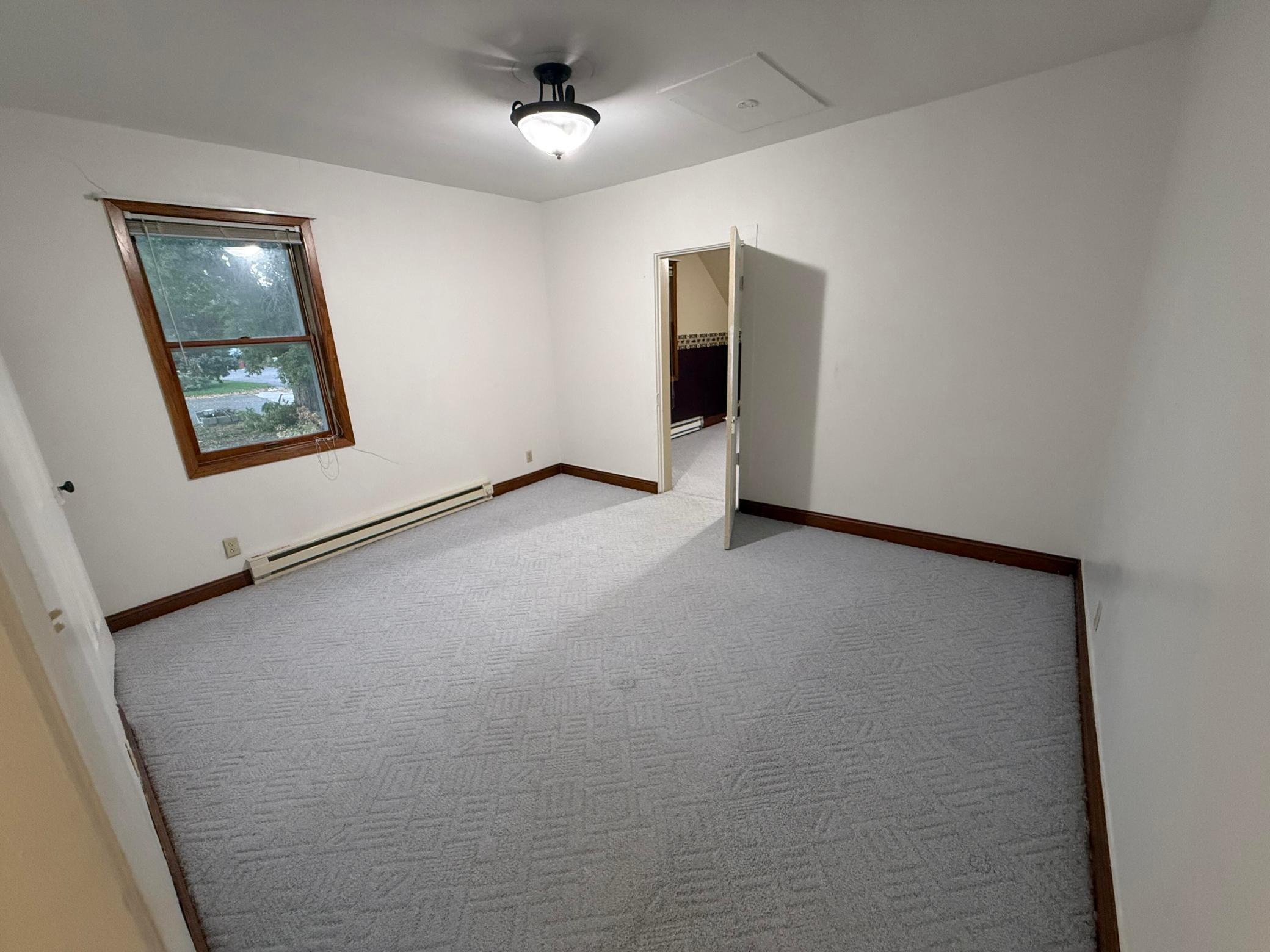 1990 single family home for sale at 103 1st Street N in Evansville, MN — 7 bed, 3 bath (photo 11 of 26)