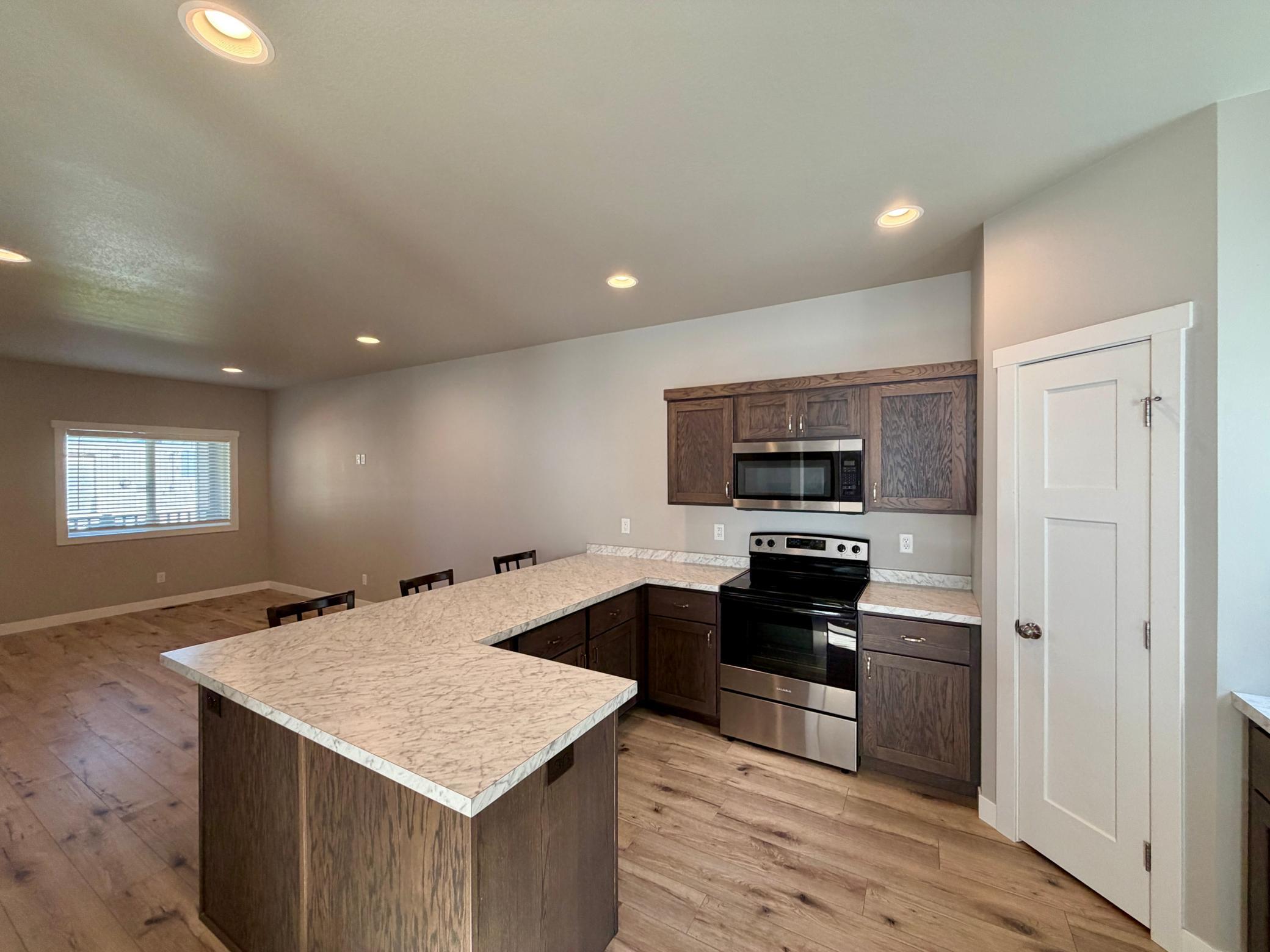 2022 townhouse for sale at 1412 1st Avenue S in Fargo, ND — 4 bed, 2 bath (photo 11 of 22)