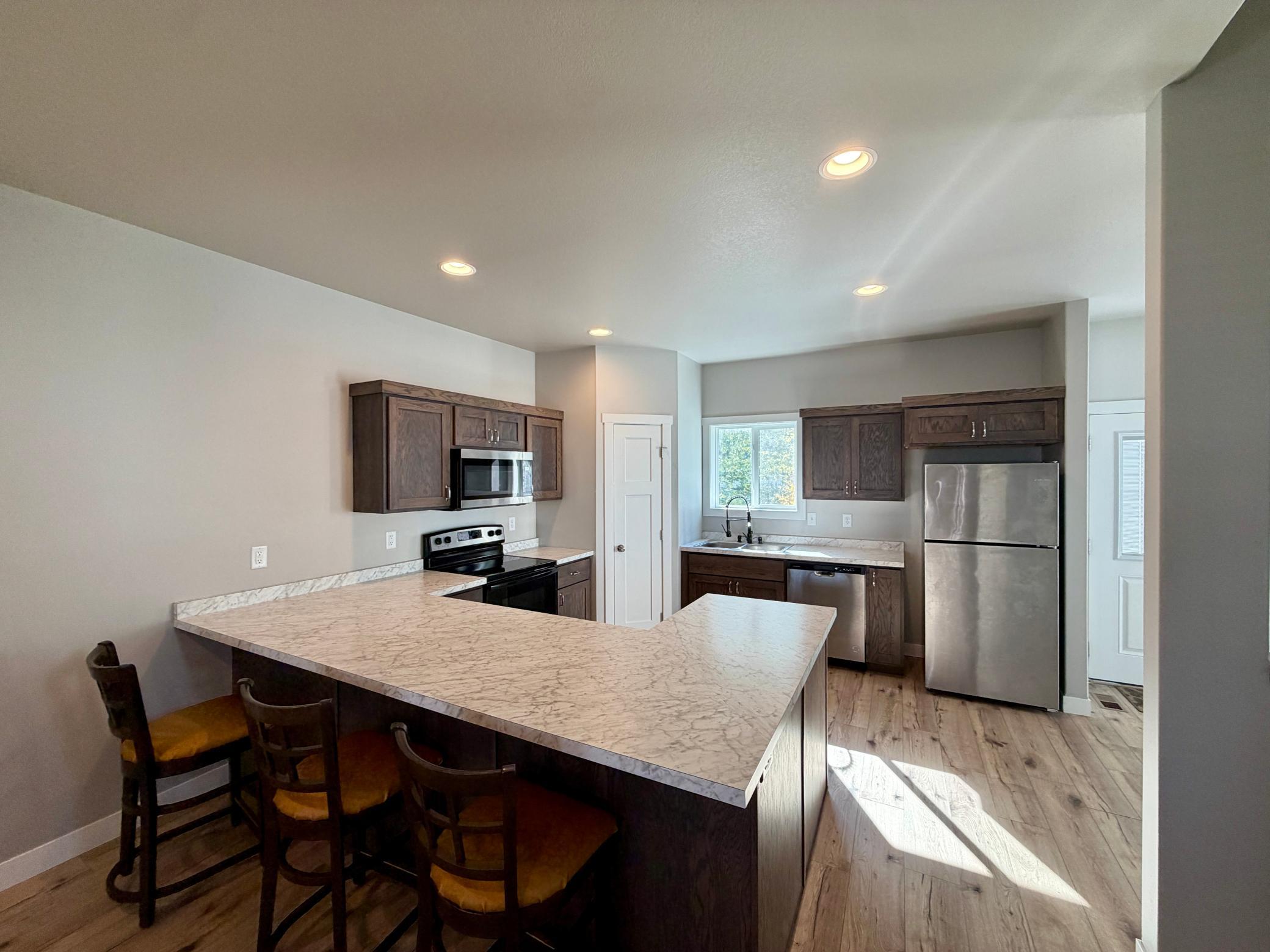 2022 townhouse for sale at 1412 1st Avenue S in Fargo, ND — 4 bed, 2 bath (photo 10 of 22)