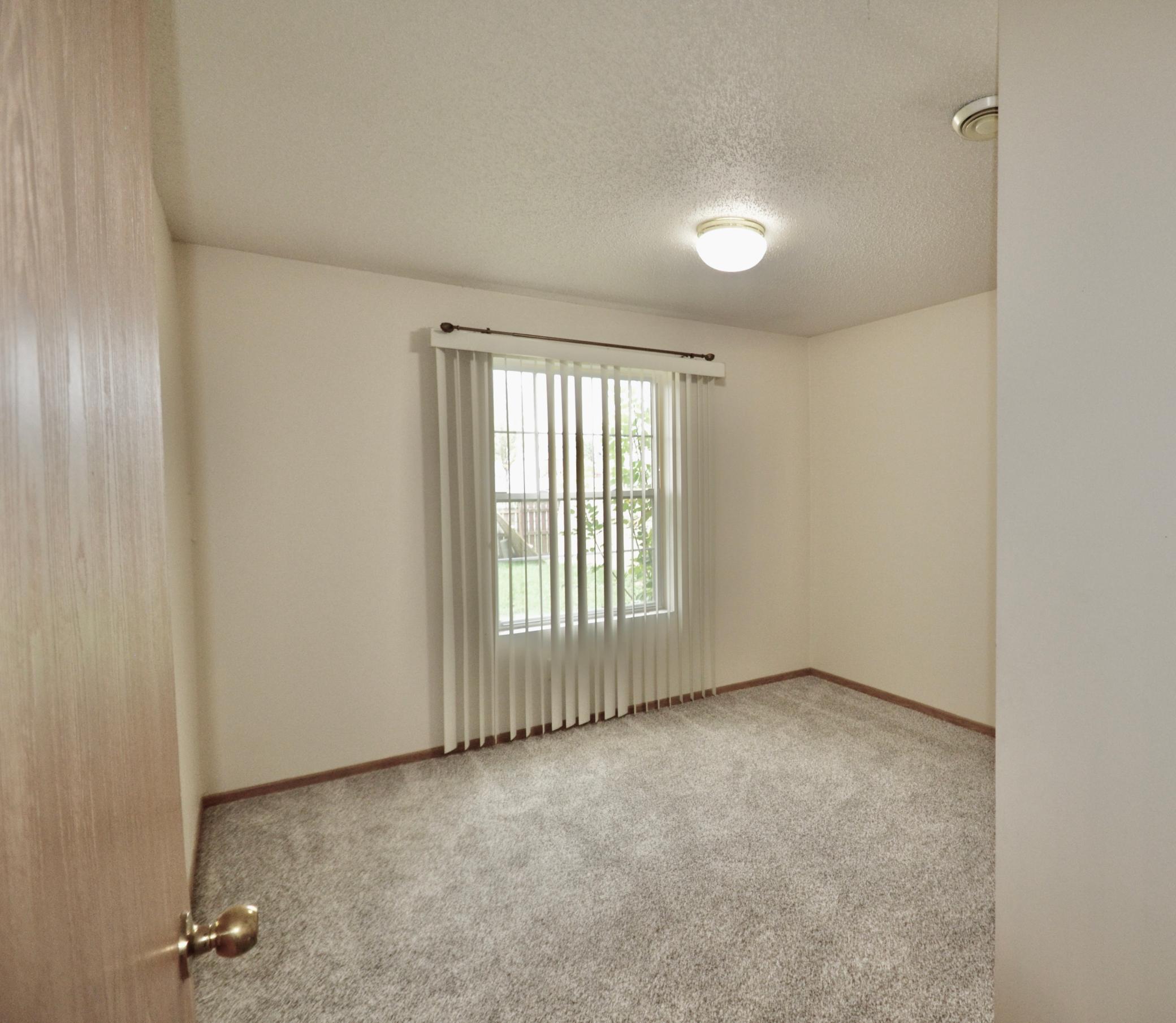 1996 twin home for sale at 819 W 12 1/2 Avenue W in West Fargo, ND — 4 bed, 2 bath (photo 14 of 26)
