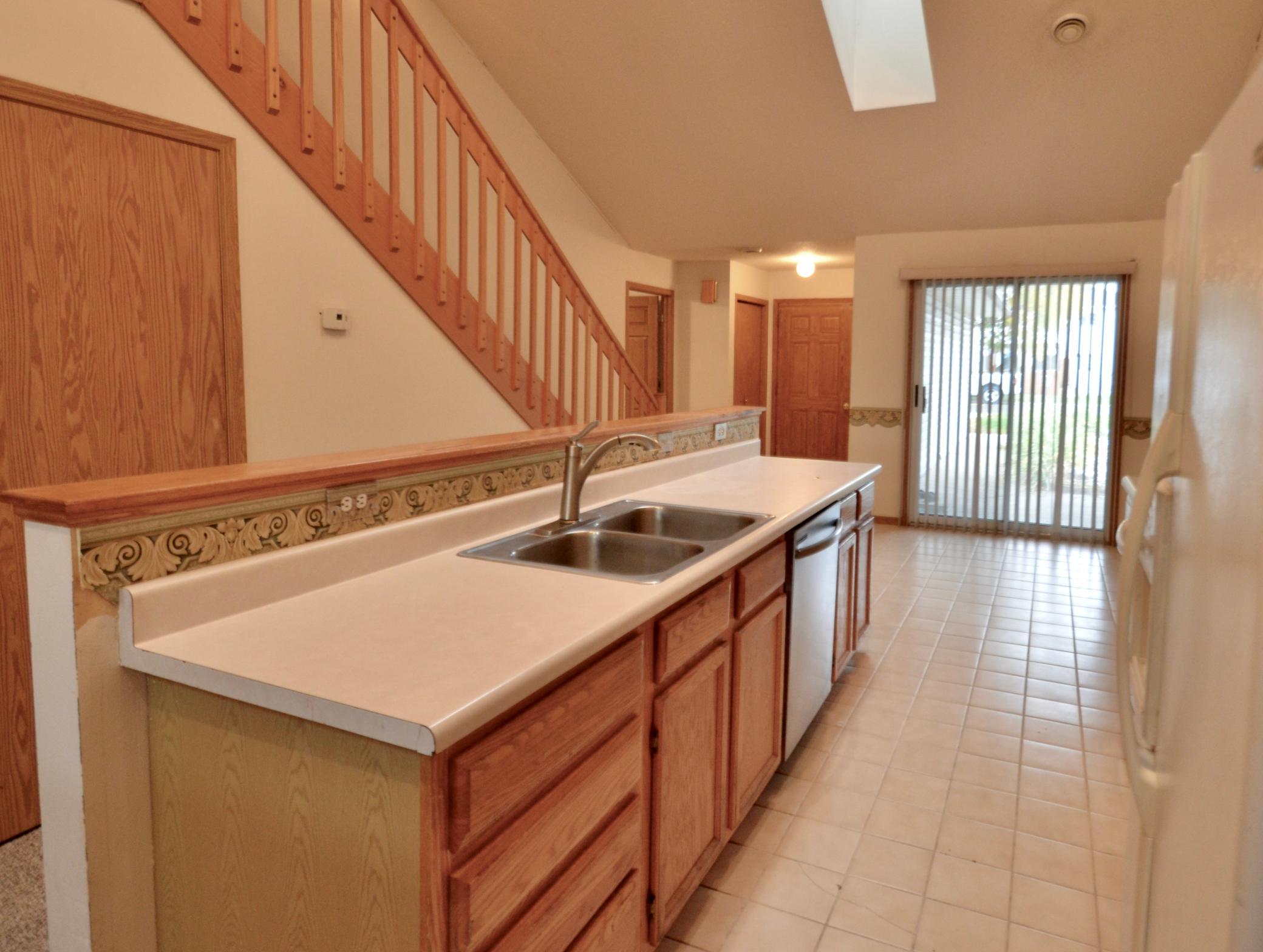 1996 twin home for sale at 819 W 12 1/2 Avenue W in West Fargo, ND — 4 bed, 2 bath (photo 23 of 26)