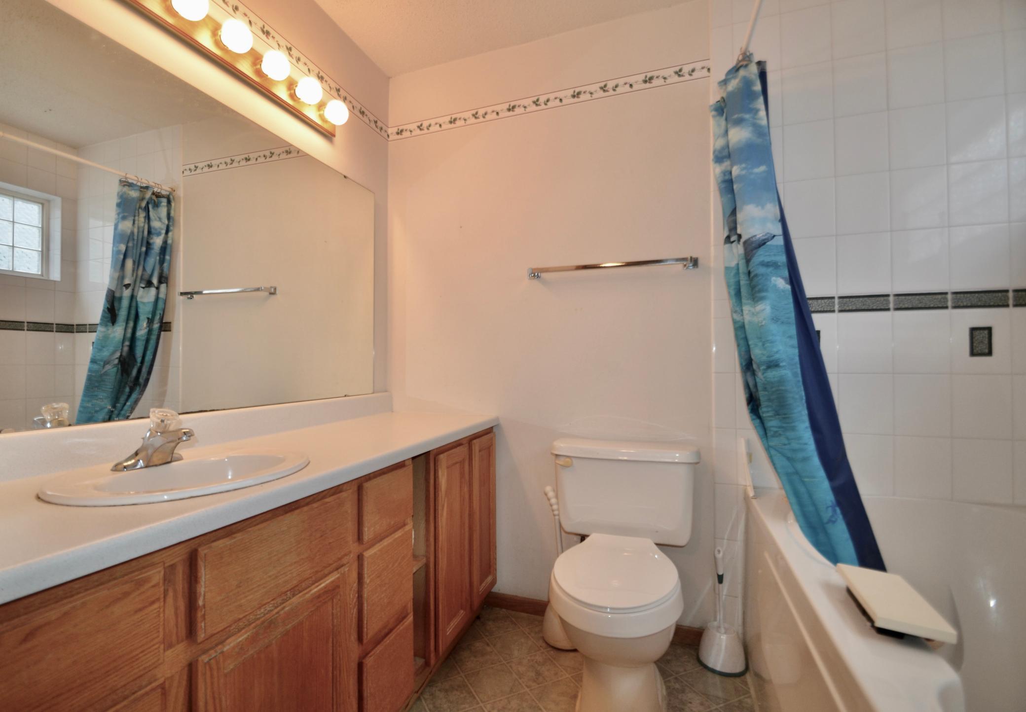 1996 twin home for sale at 819 W 12 1/2 Avenue W in West Fargo, ND — 4 bed, 2 bath (photo 10 of 26)