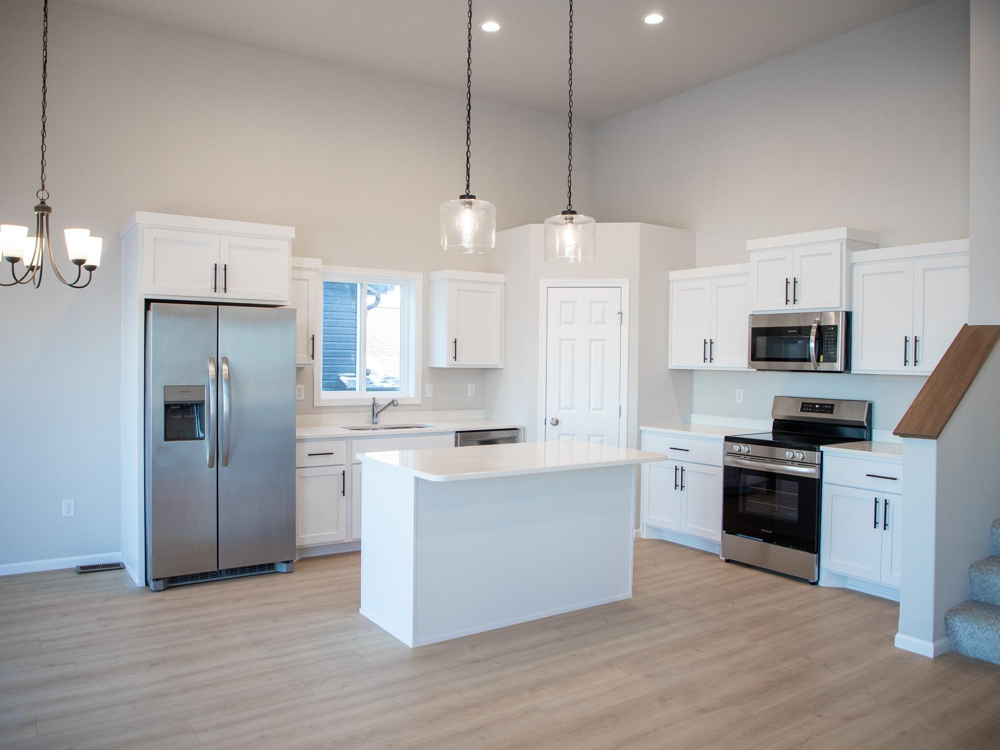 2025 single family home for sale at 1187 Rachel Drive W in West Fargo, ND — 3 bed, 3 bath (photo 7 of 30)