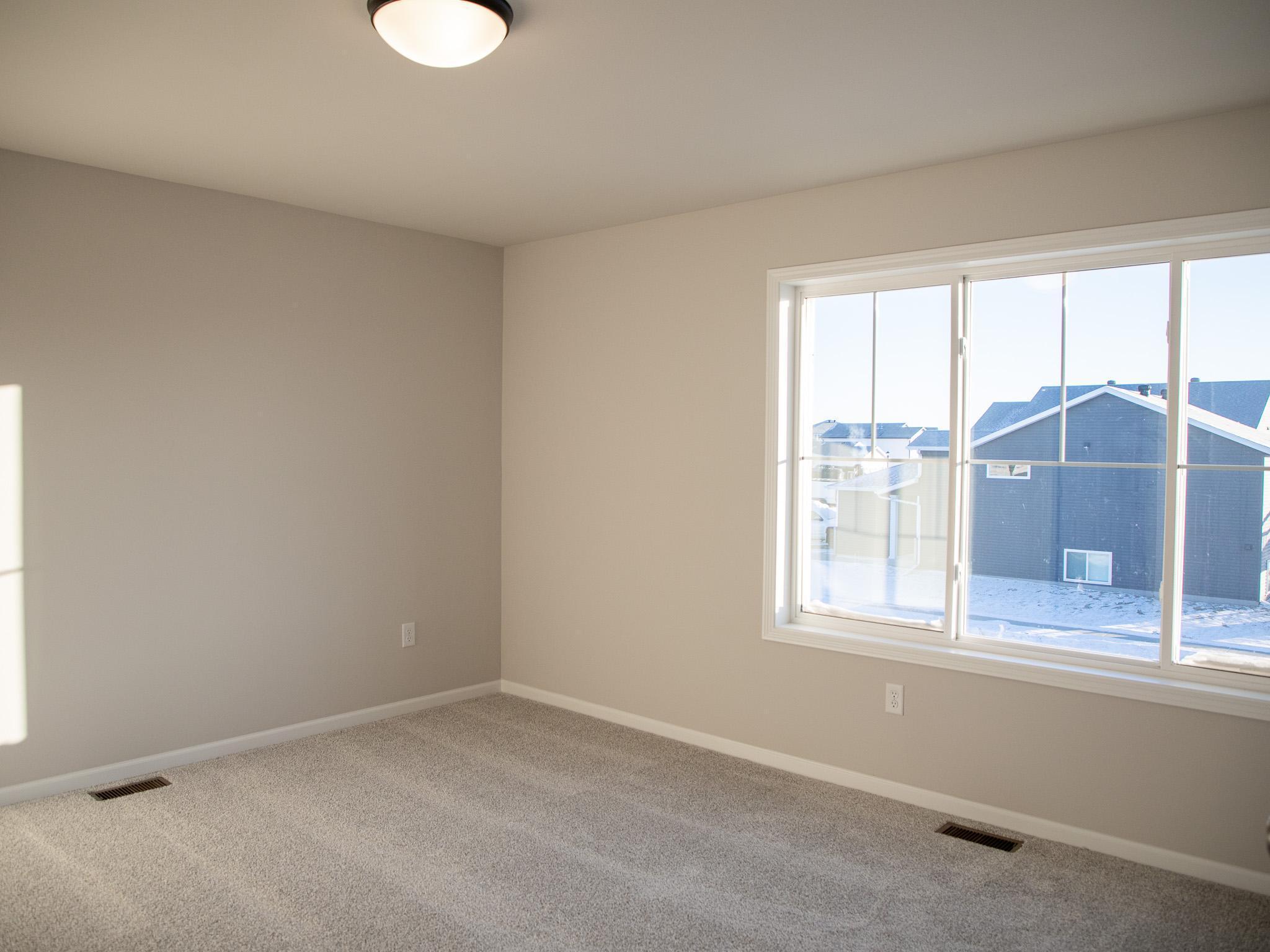 2025 single family home for sale at 1187 Rachel Drive W in West Fargo, ND — 3 bed, 3 bath (photo 10 of 30)