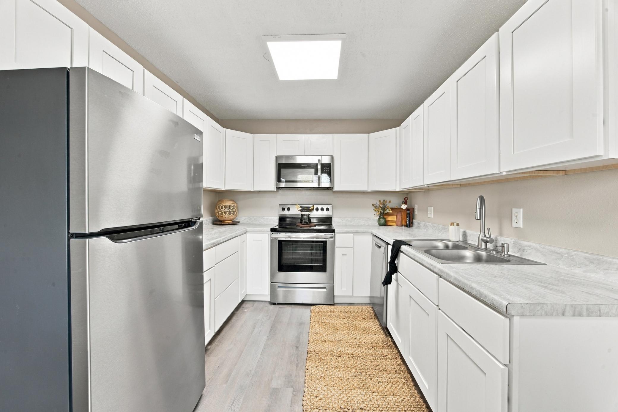 1975 home for sale at 974 5th Avenue W, Unit C in West Fargo, ND — 3 bed, 2 bath (photo 6 of 25)