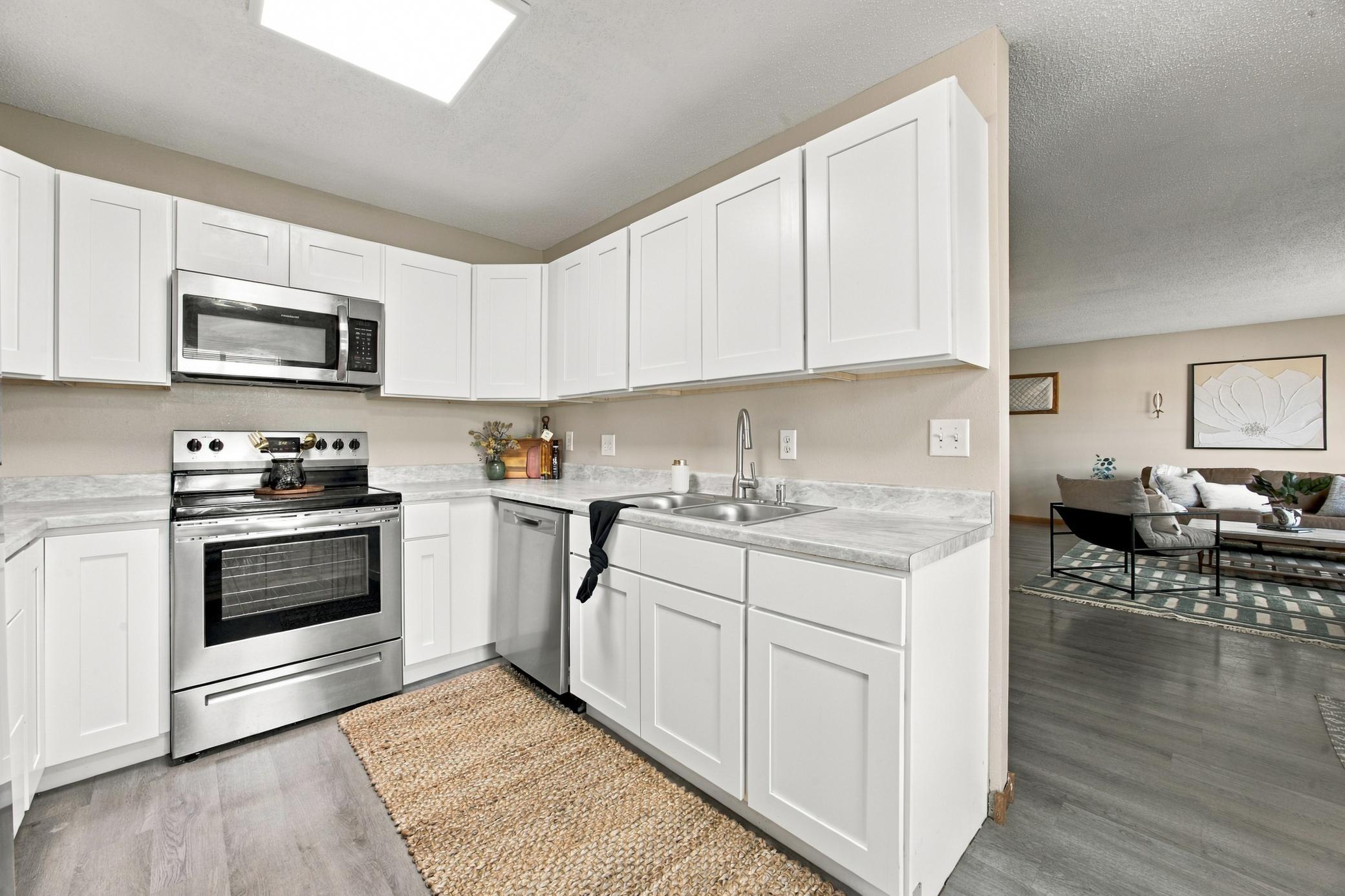 1975 home for sale at 974 5th Avenue W, Unit C in West Fargo, ND — 3 bed, 2 bath (photo 7 of 25)
