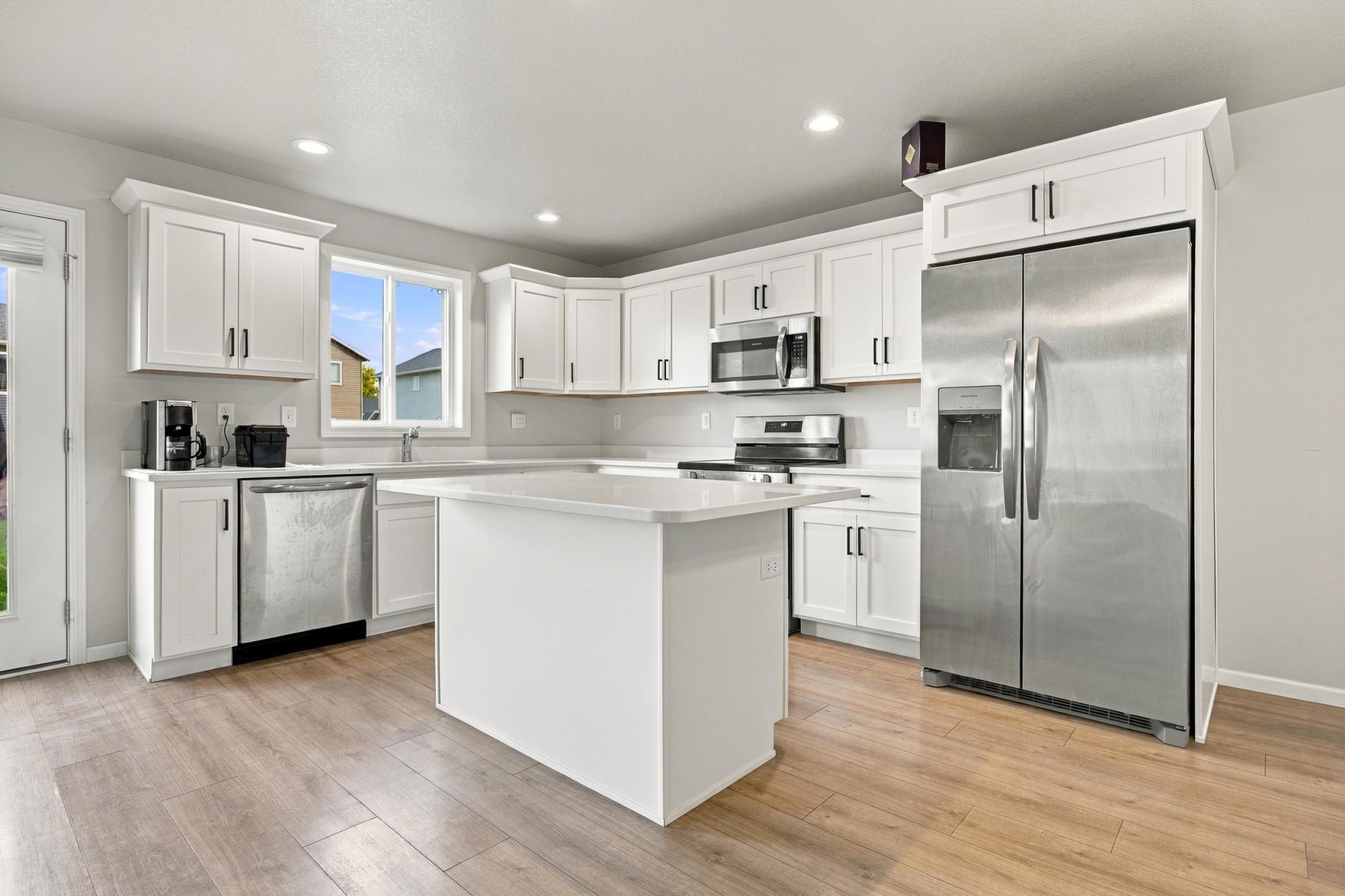 2023 single family home for sale at 1228 Rachel Drive W in West Fargo, ND — 3 bed, 3 bath (photo 2 of 34)