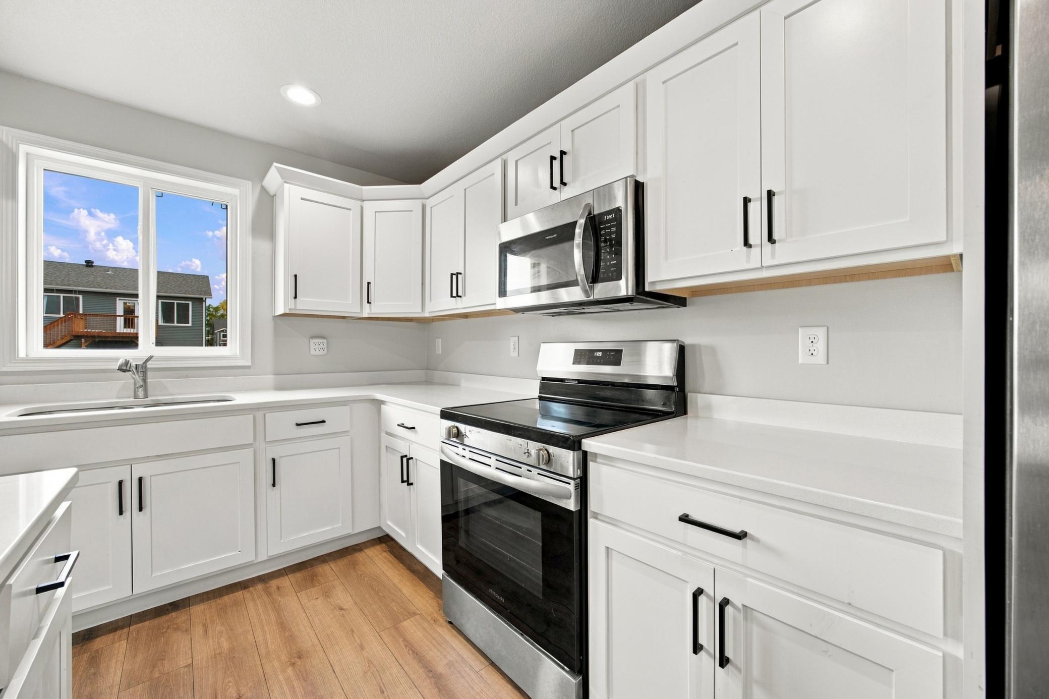 2023 single family home for sale at 1228 Rachel Drive W in West Fargo, ND — 3 bed, 3 bath (photo 4 of 34)