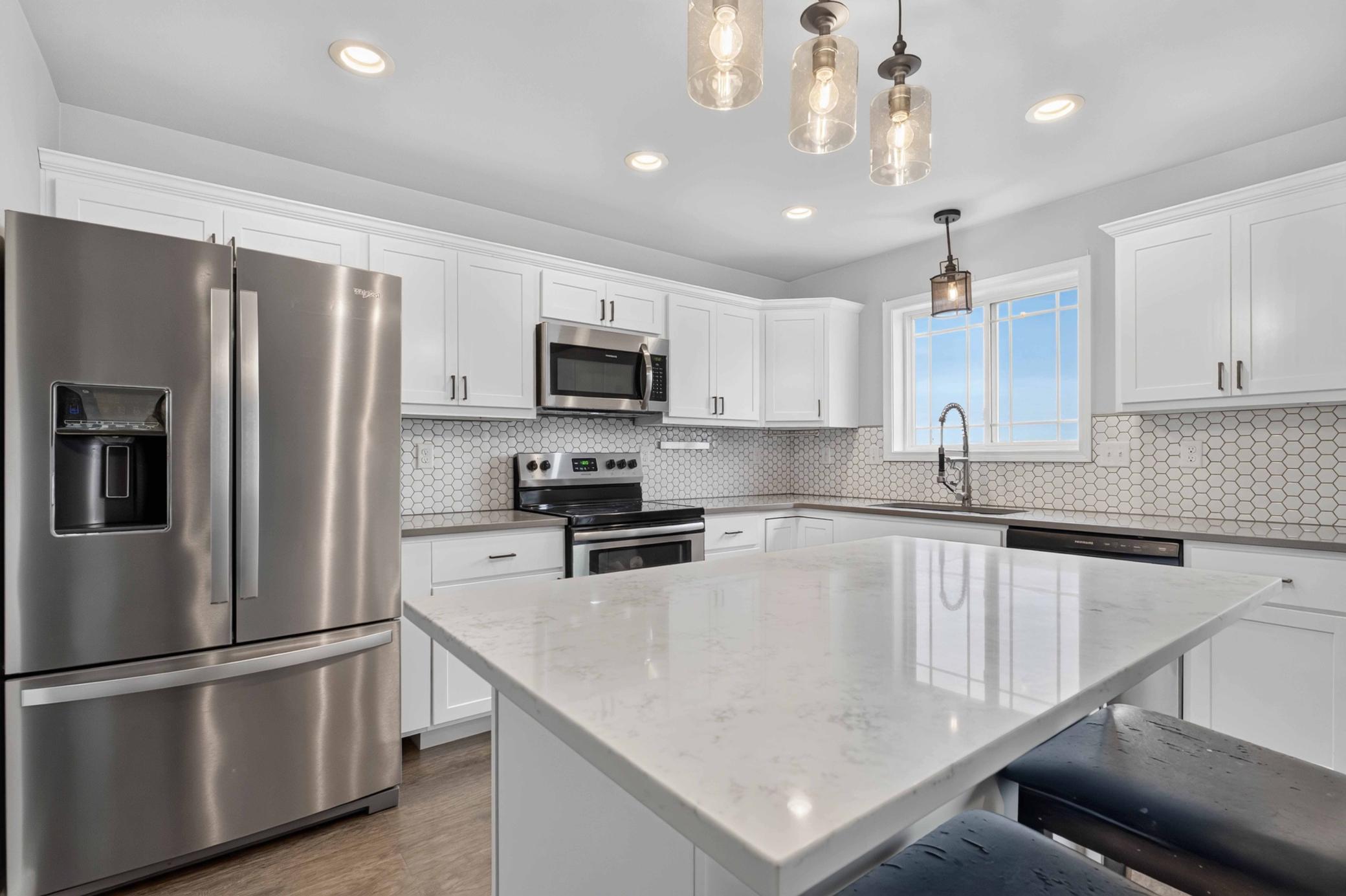 2018 single family home for sale at 1074 Highland Lane W in West Fargo, ND — 4 bed, 4 bath (photo 2 of 32)