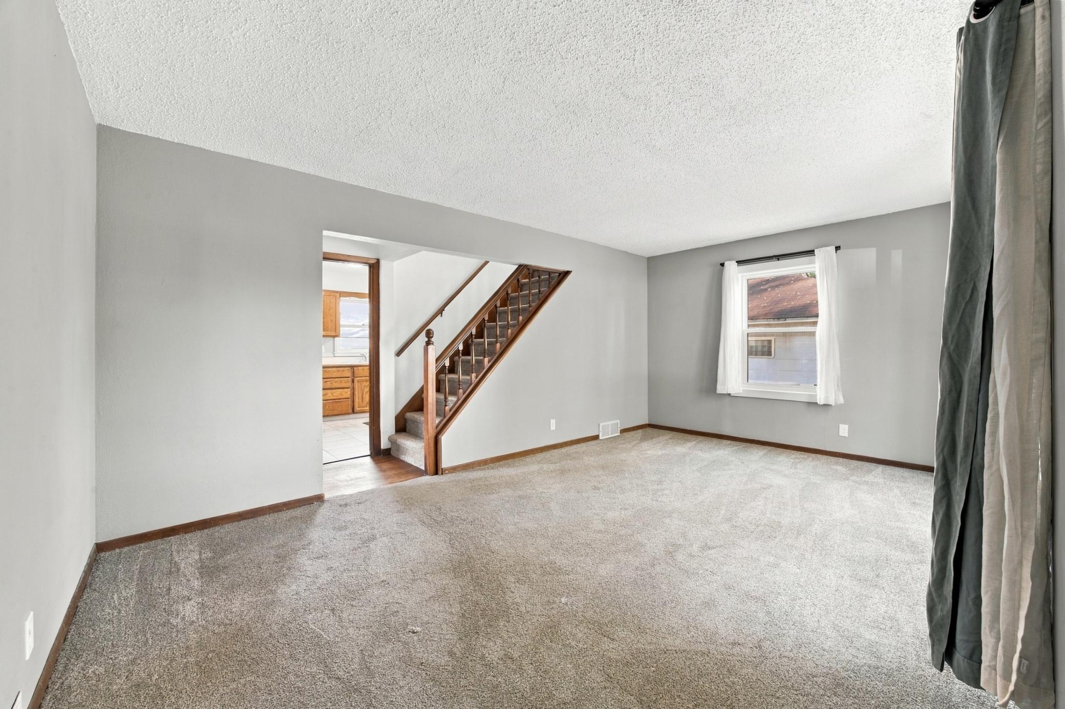 1953 single family home for sale at 52 16 1/2 Avenue N in Fargo, ND — 4 bed, 2 bath (photo 4 of 36)